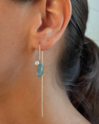 aquamarine pearl sterling silver chain threads earrings on model